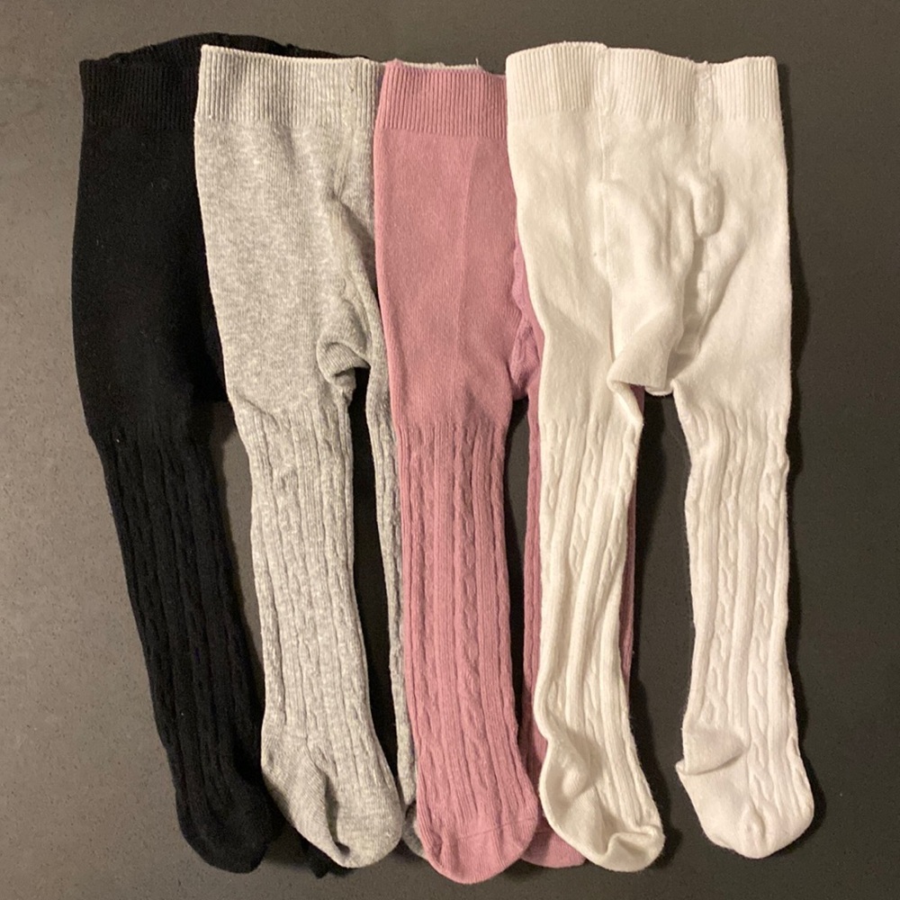 4 pairs of baby girl knit leggings. 0-6 mo.